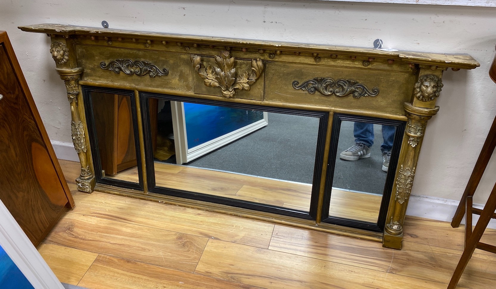 A Regency giltwood and composition triple plate overmantel mirror, width 147cm, height 70cm